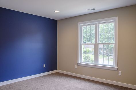 Master suite with blue royal blue accent wall ©Balducci Builders Royal Blue Bedroom Walls, Accent Wall Blue Bedroom, Blue Colour Wall Paint, Royal Blue Accent Wall Bedroom, Royal Blue Accent Wall Living Room, Royal Blue Wall Paint, Royal Blue Wall Paint Bedroom, Royal Blue Accent Wall, Blue Colour Wall Painting Design