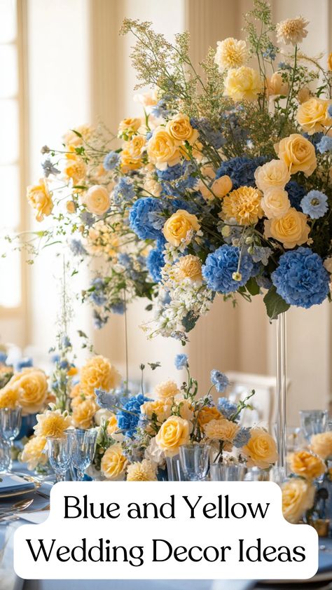 Elegant blue and yellow wedding decor featuring floral arrangements and table settings, creating a bright and stylish atmosphere for a memorable celebration. Light Blue And Yellow Wedding Cake, Yellow Spring Wedding Theme, Dusty Blue And Pale Yellow Wedding Theme, Blue Yellow Wedding Decor, Blue And Yellow Tablescapes, Light Blue And Yellow Wedding Theme, Blue And Yellow Flower Arrangements, Yellow And Blue Wedding Flowers, Yellow And Blue Wedding Theme