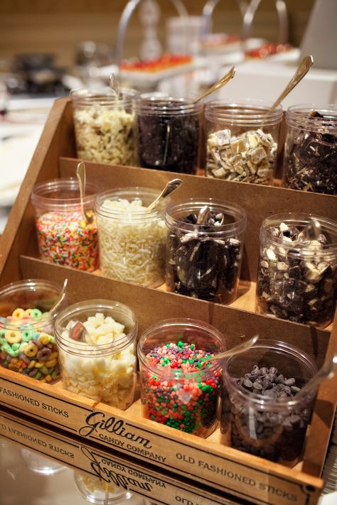 Ice Cream Sundae Bar with All the Fixings Ice Cream Topping Bar Display, Ice Cream Dessert Bar Wedding, Wedding Food Ice Cream Bar, Sunday Ice Cream Bar, Ice Cream Floats Bar, Mini Ice Cream Bar, Self Serve Ice Cream Bar, Wedding Sundae Bar Ideas, Ice Cream Table Ideas Sundae Bar