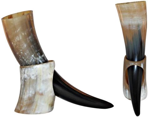 Drinking Horn with Stand made of ox horn-comes with polished exterior and Waterproof Interior. The horn measures approx 13 Inches long - holds approx - up to 10 to 13 oz Please Note* Horn mugs are natural product and they are unique in color and pattern as two horns are never same. The Viking horn is carefully treated with a non-toxic, long-lasting lacquer on the interior to ensure healthy drink quality. 100 PERCENT LEAK FREE SATISFACTION Viking Drink, Game Of Thrones Theme, Viking Horn, Viking Metal, Viking Drinking Horn, Drinking Horn, Medieval Ages, Drinking Horns, Beer Cup