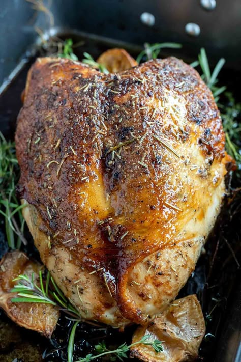 This Oven Roasted Turkey Breast Recipe is perfect for those small holiday menus. If you're hosting a small Christmas or Thanksgiving Dinner, this butter and herb turkey breast will be perfect! #turkeybreastrecipes #turkeyrecipes #holidayrecipes #thansgivingrecipes #thanksgivingfood #thanksgiving Turkey Breast Roasted In Oven, Turkey Breast With Bone In Oven, Turkey Breast With Ribs Recipe, Perfect Turkey Breast, Fresh Bone In Turkey Breast Recipes, Katie Lee Biegel Dutch Oven Turkey Breast, Cooking A Turkey Breast In The Oven, Herbed Turkey Breast, Whole Turkey Breast Recipes Oven