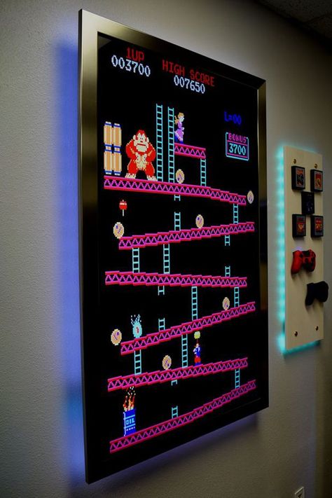 Games Room Furniture, Arcade Style Bedroom, Wall Mount Games, Tv Wall Game Room, Wall Mounted Board Games, Games Room Wall Ideas, Home Arcade Room Ideas Modern, Game Room Wall Decals, Game Room Pictures Wall Art