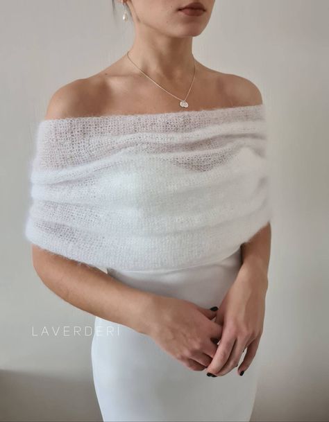 *EVERLY* shoulder wrap Delicate, feather light warm yarn wraps around your shoulders... This wrap will be a great complement to a dress and will beautifully cover the shoulders during the ceremony and certainly will warm you up ♡ * Elegant off-the-shoulder design * Soft airy yarn * 60% finest mohair, 40% polyamid * Buttons or pearls closure *closure for decorative use only * Handmade CARE Gentle hand wash 30 degrees Lay flat on surface to dry and iron with steam if necessary with a protective co Winter Evening Dresses, Bridal Cape Winter, Winter Gowns, Winter Wedding Shawl, Warm Dress, Dress Cape, Evening Wraps, Bridal Cover Up, Bridal Shower Outfit