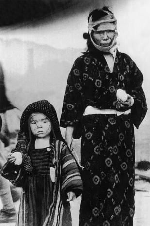 Nagasaki bombing - A look back: 70th anniversary of the atomic bombing Hiroshima and Nagasaki - Pictures - CBS News Hiroshima Nagasaki, Memorial Museum, Japanese People, Nagasaki, Hiroshima, Mother And Child, A Mother, Culture Art, Atom