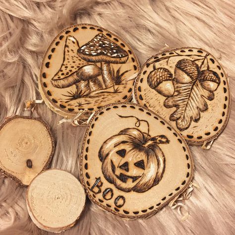 Tried some Autumn Designs on some smaller Wood Slices ... challenging but so much fun and so relaxing 🍁🎃🍄 . . #woodburning #woodburningart #pyrography #pyrographyart #burntoctober #inktober2018 #inktober #learnsomethingneweveryday #cre8tivecre8tions #whimsicalgirls #whimsicalart #drawingonwood #brennpeter Pumpkin Wood Burning, Halloween Pyrography Ideas, Fall Pyrography Ideas, Fall Pyrography, Autumn Pyrography, Halloween Woodburning, Halloween Wood Burning Ideas, Halloween Wood Burning, Halloween Pyrography