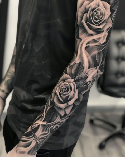 5 Stunning Black Rose Tattoo Designs for a Bold Statement in 2024 Black And White Rose Sleeve Tattoo, Full Arm Rose Tattoo, Negative Rose Tattoo, Roses Filler Tattoo, Skull Rose Sleeve Tattoo, Male Rose Tattoo Sleeve, Dark Rose Sleeve Tattoo, Roses Sleeve Tattoos For Guys, Grunge Floral Tattoo