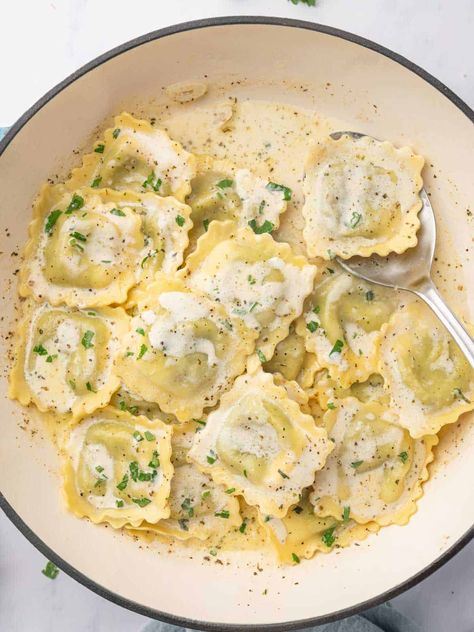 Enjoy a delicious homemade meal without the hassle. Try this quick and easy Spinach and Ricotta Ravioli recipe ready in just 20 minutes. Spinach Ricotta Pasta Ravioli, Ravioli And Zucchini, Recipes With Spinach Ravioli, Chicken Spinach Ravioli Recipe, Simple Sauce For Ravioli, Sauce For Spinach Ricotta Ravioli, Spinach Ricotta Ravioli Recipe, Homemade Spinach Ravioli, Simple Ravioli Recipe