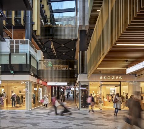 Turning the traditional idea of the ‘shopping mall’ inside out, Commercial Bay presents a new model for the retail typology: an open-air, laneway-based retail environment configured over three levels. The project embodies a spirit of generosity, creating two entirely new pedestrian routes through the city block, connecting transit nodes, and enhancing the pedestrian experience of the city center. Open Mall Design, Shopping Mall Exterior, Retail Aesthetic, Mall Concept, Mall Photography, Curtain House, Retail Facade, Commercial Design Exterior, Retail Architecture