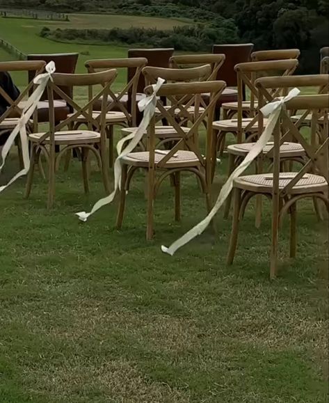 Alternative Wedding Aisle, Garden Wedding Chairs, White Chair Bows Wedding, White Garden Chairs Wedding Ceremony, Wedding Aisle No Flowers, Ribbon Aisle Markers, Chair Markers For Wedding, Minimal Wedding Aisle, Ribbon Aisle Decor