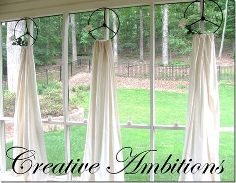 Tractor wheels and fabric--great on the patio or in the sun room. Unique Window Treatments, Simple Window Treatments, Window Treatments Ideas, Window Toppers, Faux Roman Shades, Diy Window Treatments, Unique Hardware, Unique Curtains, Custom Drapes