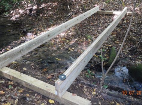 Building an ATV Bridge Diy Bridge Over Creek, Atv Bridge, Yard Bridge, Backyard Bridges, Outdoor Bridges, Pond Bridge, Bridge Project, Deer Hunting Season, Creek Bridge