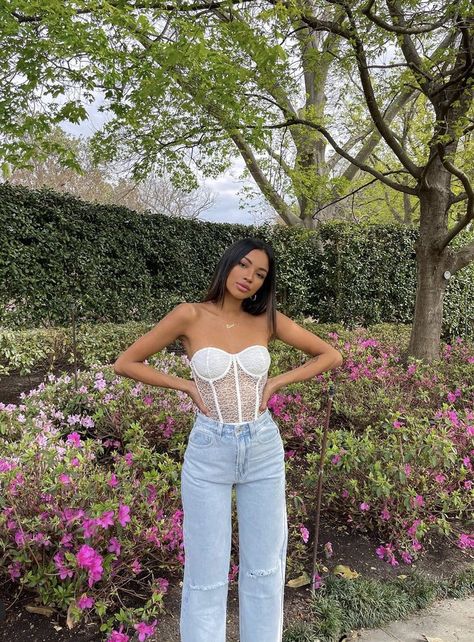 Nataly Lorenzo wearing BeginningBoutique white lace corset top and wide leg blue jeans Corset And Jeans Outfit, Outfits With Corsets, Corset Top And Jeans, White Corset Outfit, Corset With Jeans, White Lace Corset Top, Corset And Jeans, Corset Top Outfit, White Lace Corset