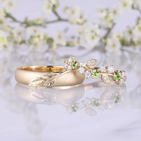 Mens Engagement Ring Set Couple Rings Set For Men And Women Peridot Wedding Ring Set Nature Inspired Men Wedding Band August Birthstone Link to the Men's ring: https://www.etsy.com/listing/1756321847 Moss agate Couple Rings Set: https://www.etsy.com/listing/1707194900 RING DETAILS METAL: available in 14k or 18k solid yellow gold, white gold, rose gold ( Please contact me directly for palladium or platinum.) WOMENS Ring Center stone: Peridot SHAPE: Round cut Side Stone: Moissanite Shaped: Round c Couples Engagement Rings, Earthy Engagement Rings, Engagement Couple Rings, Ring Set Couple, Peridot Wedding Ring, Wedding Ring Couple, Nature Wedding Band, Mens Engagement Ring, Men Wedding Band