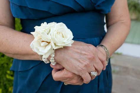 The mothers and grandmothers will have wrist corsages of ivory spray roses and gold seeded eucalyptus on a pearl beaded bracelet. Mother Corsage Wedding Wristlets, White Wedding Corsages For Mothers, Wrist Corsage Wedding Mothers Simple, White Rose Corsage Wrist, Corsage Wedding Mother, White Rose Corsage, Corsages Wedding, Pink Astilbe, Wedding Wristlets