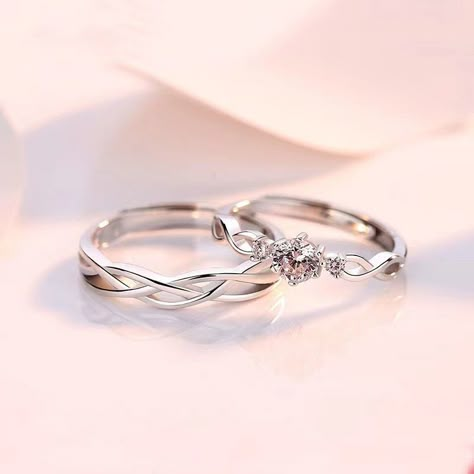 This simple ring is the male ring of couple rings, the overall ring uses a hollow twist design, which is a symbol of continued love for you. The men ring is made of S925 sterling silver, adjusted circle for more couple's choice. if you choose the couple rings together, more meaning for your love.Weight: 1.55 gMaterial: 925 SilverPlating Color: Silver Kasut Pengantin, Wedding Rings Sets His, Wedding Rings Sets His And Hers, خواتم خطوبة, Cute Promise Rings, Couple Ring Design, Rings For Couples, Rings Couple, Engagement Rings Couple