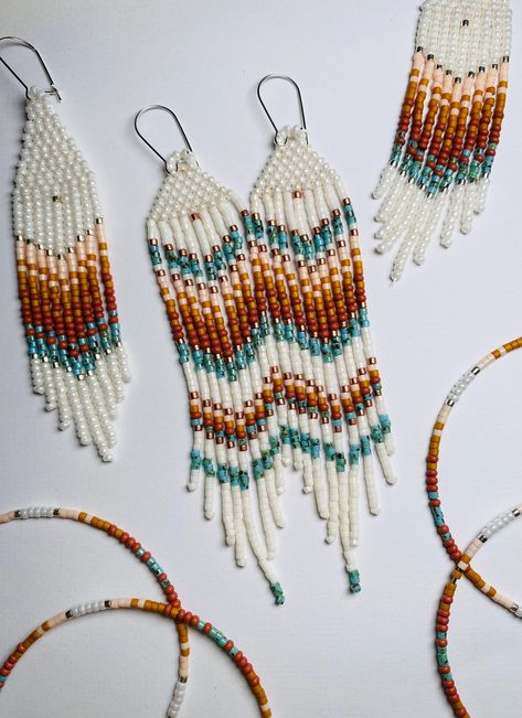 Handmade Boho Fringe Earrings made by Artisan Betty Conant one seed bead at a time.  These beaded Fringe Earrings hang about 4" long and sway beautifully. Sterling silver ear hooks Inspired by Native American Design. Native Seed Bead Earrings, Native Beaded Earrings Patterns, Seed Bead Earrings Ideas, Native Beading Patterns Design, Fringe Beaded Earrings Pattern, Fall Beaded Earrings, Bead Earring Patterns, Native American Beadwork Earrings, Fringe Earrings Diy