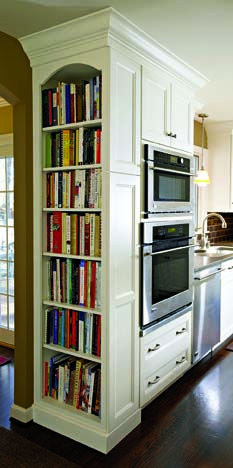 i love the idea of taking an empty wall off the kitchen and turning it into a built-in bookcase for cookbooks. I need it to have doors though so it doesn't look cluttered. ;-) Cookbook Shelf, Double Ovens, Classic White Kitchen, Kabinet Dapur, Storage Wall, Kitchen Redo, Kitchen Reno, Kitchen Remodel Idea, Kitchen Makeover