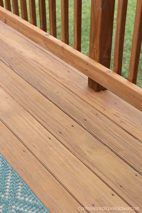 Staining the deck with Thompson's Waterseal. Deck Stain And Sealer Colors, Behr Deck Stain Colors Solid, Canyon Brown Deck Stain Sherwin Williams, Light Brown Deck Paint, Wooden Railings For Balcony, Behr Sandal Deck Stain, Back Deck Stain Ideas, Wooden Deck Stain Colors, Super Deck Sherwin Williams