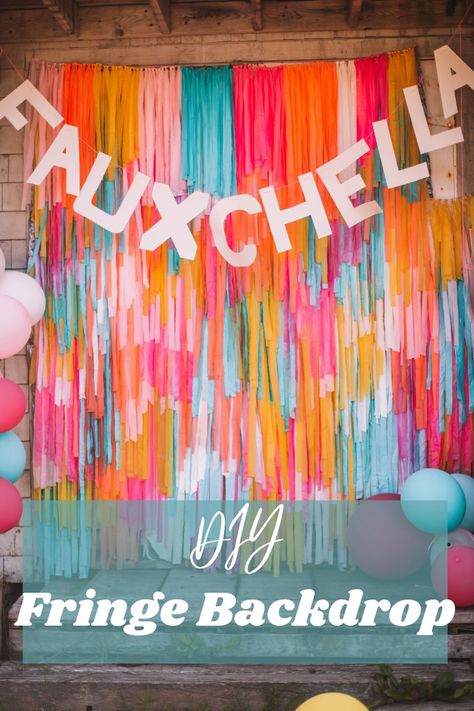 The text reads DIY Fringe Backdrop. The photo behind the text is a big backdrop made of many different colour strands. A Fauxchella banner also hangs at the top of the backdrop. Streamers Photo Backdrop, Mylar Backdrop Diy, Diy Plastic Table Cloth Photo Background, Diy Tissue Paper Backdrop, Diy Colorful Backdrop, Backdrop Made From Plastic Tablecloths, Tassle Backdrop Photo Booths, Diy Tablecloth Garland, Table Cloth Backdrop Diy Birthday