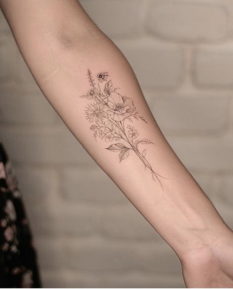 Forearm Tattoo Women Bouquet, Delicate Flower Tattoo Inner Arm, Accent Flower Tattoos, Small Floral Arm Tattoos For Women, Floral Bouquet Tattoo Forearm, Flower Inner Forearm Tattoo, Inner Forearm Tattoo Flowers, Wildflower Forearm Tattoo Women, Small Underarm Tattoo Women