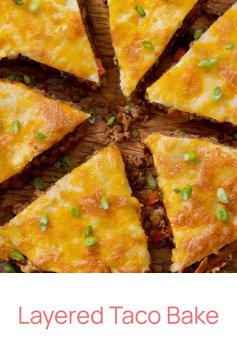 Layered taco bake topped with melted cheese and green onions, cut into triangles. Layered Taco Bake, Layered Taco, Baked Tacos Recipe, Minced Beef Recipes, Minced Meat Recipe, Taco Bake, Ground Meat Recipes, Mince Recipes, Global Cuisine