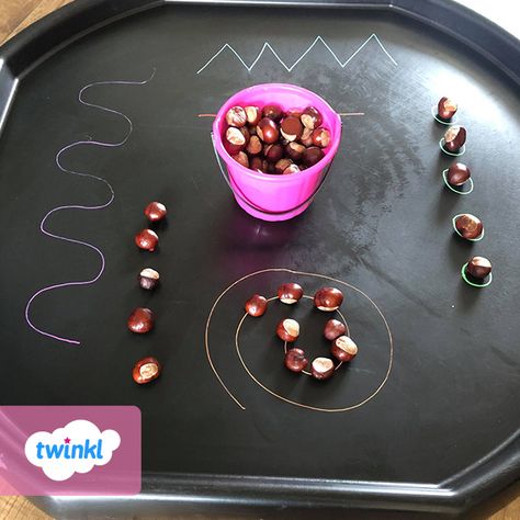 Autumn is such a wonderful time of year and Laura’s children had a great time using conkers to cover a selection of patterns. This is a great way to develop fine motor skills in young children. Continue your mark making activity by downloading our hedge-themed pattern cards, they're the perfect Autumn themed activity. Click to download! #autumn #tufftray #conkers #markmaking #pencilcontrol #eyfs #earlyyears #teachingresources #teachingideas #teaching #twinkl #twinklresources #eyfs Eyfs Counting To 5, Autumn Planning Ideas Eyfs, Conkers Tuff Tray, Conkers Activity Eyfs, Autumn Mark Making, Autumnal Activities For Kids, Conker Tuff Tray Ideas, Autumn Number Activities Eyfs, Conkers Activities Eyfs