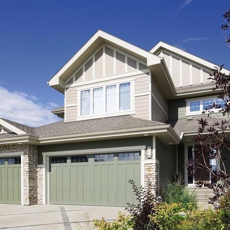 With a beautiful sage green tone, these steel garage doors are a stand-out home feature. | Instagram San Miguel De Allende, Green Garage Doors, Green Garage Door, Green Garage, Contemporary Garage Doors, Color Projects, Carriage House Doors, Sectional Garage Doors, House Colour