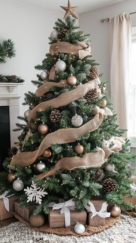 Discover 21+ gorgeous Christmas tree ideas for 2024 to make your home sparkle this season! Create a timeless look with classic red and green decor or opt for a chic vibe with silver, gold, or rose gold ornaments. For a cozy feel, try a rustic farmhouse theme featuring burlap ribbons and wooden accents. #ChristmasTreeDecor #HolidayTreeIdeas #Christmas2024Decor #FestiveTreeInspo Wood Theme Christmas Decor, Natural Colored Christmas Tree, Men’s Christmas Tree Ideas, Christmas Tree Decorated With Pinecones, Whimsicle Christmas Tree, Neutral Aesthetic Christmas Tree, Country Rustic Christmas Tree, Traditional Christmas Tree With Ribbon, 2025 Christmas Tree