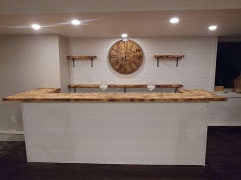 Handcrafted, custom built, basement bar. Shiplap. Burnt board bar top. Knee Wall Bar Top, Bar With Shiplap, Shiplap Basement, Shiplap Bar, Bar Downstairs, Bar Remodel, Cheap Basement Remodel, Easy Home Renovations, Wet Bar Basement