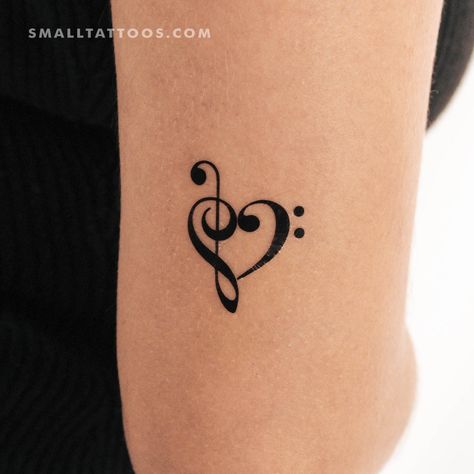 Heart composed of the bass clef and the treble clef temporary tattoo. Set of three. Size: 1.4 in / 3.4 cm (height) Music Note Friendship Tattoo, Music Best Friend Tattoos, Music Tatooes, Bass Clef Tattoo, Musical Note Tattoo, Music Heart Tattoo, Small Music Tattoos, Music Lover Tattoo, Treble Clef Heart