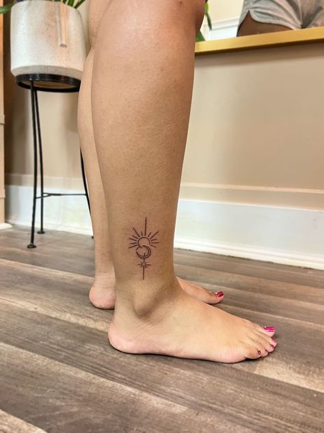 Ankle tattoo. Sun, moon, and star. Fine line tattoo Sun On Ankle Tattoo, Moon Tattoo On Ankle, Sun Moon North Star Tattoo, Sun Moon Tattoo Ankle, Sun Moon And Stars Tattoo Fine Line, Sun Ankle Tattoo, Fine Line Sun Moon Stars Tattoo, Sun Moon Star Ankle Tattoo, Sun Moon Stars Tattoo