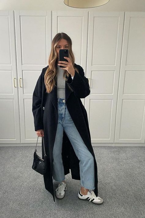 Versitle long black coat outfit ideas that will take your winter style to the next level. Black Coat Winter Outfit, Long Black Coat Outfit, Coat Winter Outfit, Coat Outfit Ideas, Black Coat Outfit, Long Coat Outfit, Short Sweater Dress, Adidas Samba Outfit, Cream Turtleneck Sweater