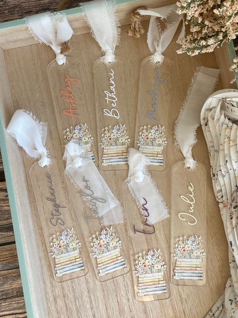 Personalized pastel floral clear acrylic bookmarks, a perfect blend of elegance and functionality.  These bookmarks are 1/16th inch thick, 1.4 inches wide, and 4.95 inches tall. Each bookmark features a delicate pastel floral design that adds a touch of whimsy and beauty to your reading experience. Key Features: Material: Durable 1/16th inch clear acrylic Dimensions: 1.4 inches wide, 4.95 inches tall Design: Beautiful pastel floral print Personalization: Personalized with yours or the recipients Clear Acrylic Bookmarks, Acrylic Bookmarks Ideas, Bookmarks Cricut, Acrylic Bookmark Ideas, Teacher Bookmark, Acrylic Bookmarks, Acrylic Crafts, Chiffon Ribbon, Custom Bookmarks