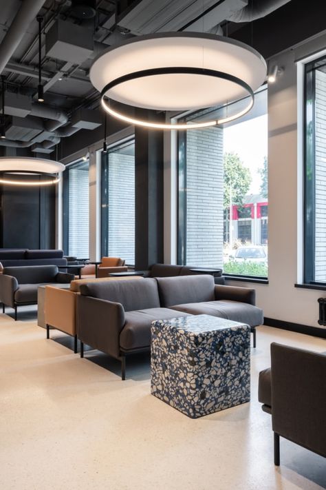 PRIDEX Multispace Spec Suite - Moscow | Office Snapshots Office Ceiling Light Design, Traditional Reception Desk, Lounge Lamps, Office Lighting Design, Office Ceiling, Open Ceiling, Office Lounge, Lounge Lighting, Modular Lounges