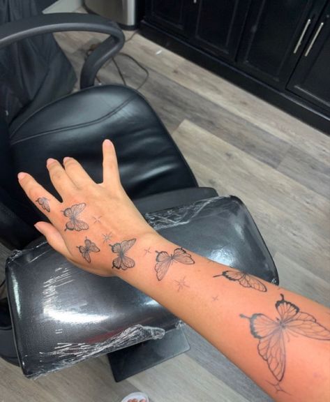 Butterflies Around Arm Tattoo, Butterfly Tattoo All Over Arm, Hand Tattoo Butterflies, First Tattoo Ideas For Women Arm, Butterflies With Names Tattoo, Butterfly Around Arm Tattoo, Patch Work Butterfly Tattoo, Butterflies Up Arm Tattoo, Butterflies Up The Arm Tattoo