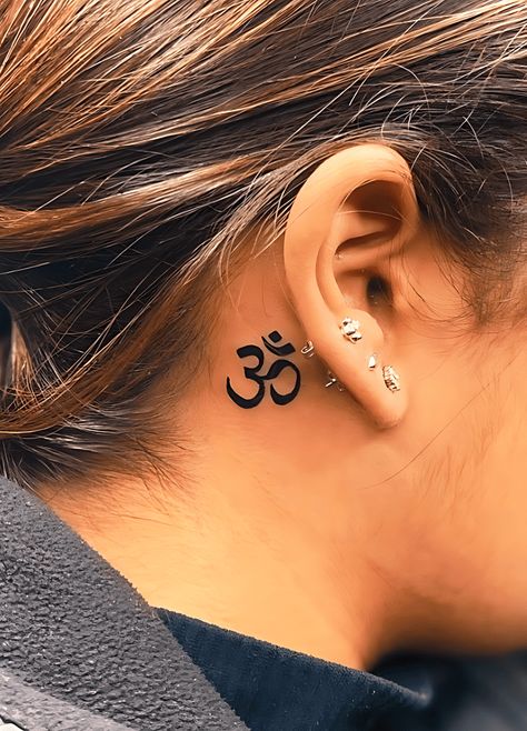 Om Neck Tattoos Women, Om Tattoo Behind Ear, Tattoo Ideas Om, Om Tattoo Ideas, Aum Tattoo, Buddhism Tattoo, Om Symbol Tattoo, Om Tattoo Design, Sanskrit Tattoo