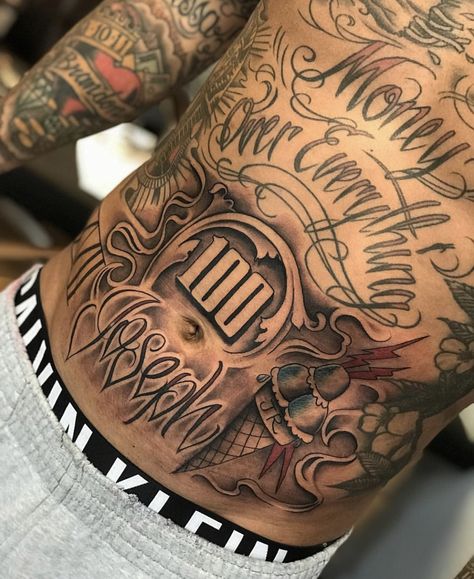 "Money Over Everything" Tat Hood Stomach Tattoos For Men, Men’s Stomach Tattoo Ideas, Mens Full Stomach Tattoo, Gangsta Stomach Tattoos For Guys, Lower Stomach Tattoos For Men, Money Bag Neck Tattoo, Money Over Everything Tattoos, Stomach Lettering Tattoos Men, Stomach Tattoos For Guys