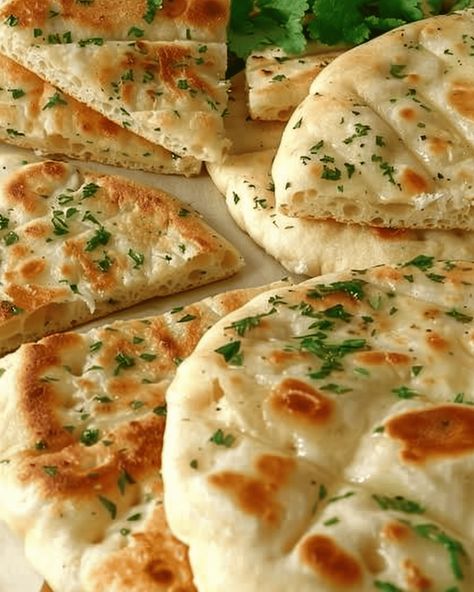 Garlic Flatbreads: A Simple Yet Flavorful Delight Nothing beats the aroma of freshly made flatbreads wafting through the kitchen, and these Garlic Flatbreads are no exception. Perfectly golden and puffed, ... Read more Garlic And Butter Flatbread Recipe, Garlic And Butter Flatbread, Quick Flatbread Recipe, Flatbread Garlic Bread, Flatbreads Recipes, Garlic Flat Bread, Cheesy Flatbread, Garlic Flatbread Recipe, Quick Flatbread