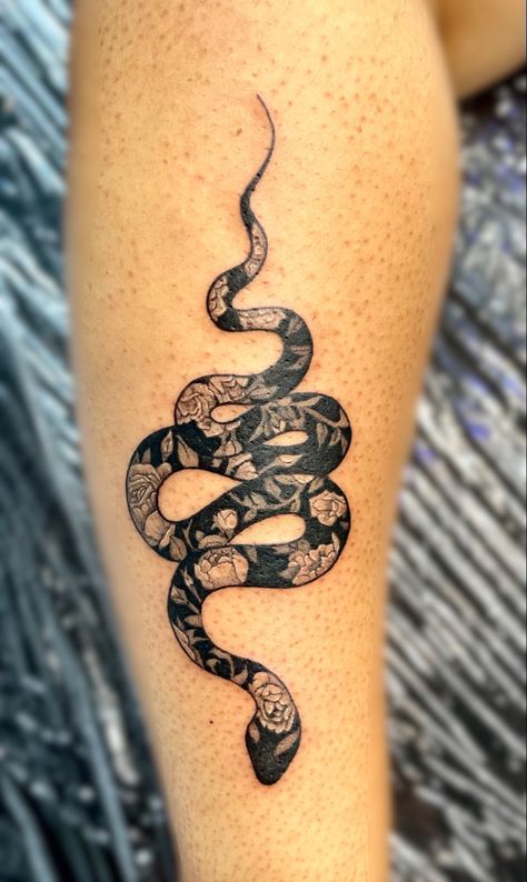 Day And Night Snake Tattoo, Unique Snake Tattoo Design, Cover Up Snake Tattoo, Snake Floral Spine Tattoo, Ball Python Tattoo With Flowers, Floral Snake Hip Tattoo, Snake And Poppy Tattoo, Patterned Snake Tattoo, Negative Space Snake Tattoo