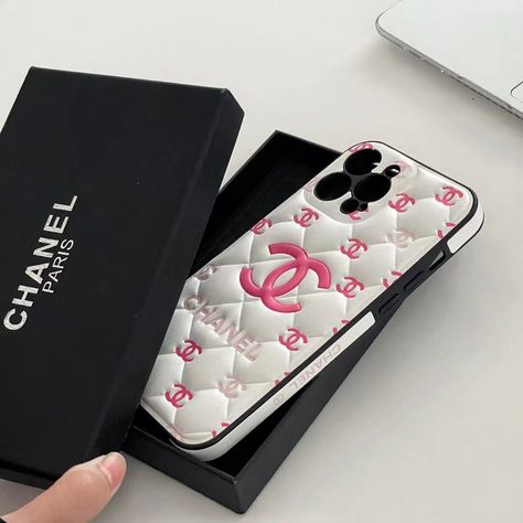 "Experience timeless elegance with our Embossed Chanel iPhone Case. Crafted with classic luxury design, this case adds sophistication to your device while providing superior protection. Elevate your style today! Iphone 15 Accessories, Elegant Phone Cases, Iphone 15 Phone Case, Chanel Phone Case, Chanel Charm, Chanel Iphone Case, Iphone Cases Bling, Luxury Iphone Cases, Bling Phone Cases