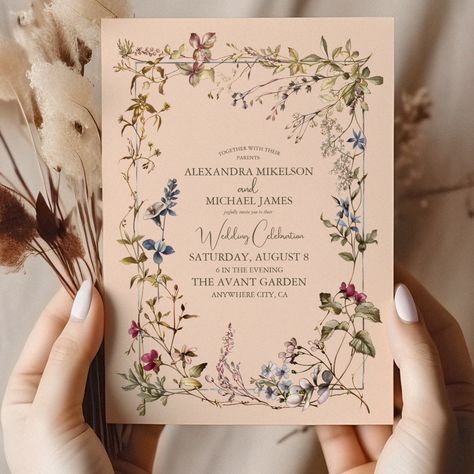 Announce your special day with timeless sophistication using our Elegant Vintage Floral Wedding Invitation. This exquisite invitation captures the romance of yesteryears with its vintage-inspired design, creating a perfect introduction to your elegant celebration.  Featuring delicate floral patterns reminiscent of bygone eras, this invitation exudes classic charm and elegance. The vintage aesthetic is further enhanced by intricate details and refined typography, ensuring a truly captivating presentation.  Printed on premium quality cardstock with meticulous attention to detail, our Elegant Vintage Floral Wedding Invitation sets the tone for an unforgettable event. Invite your loved ones to share in the joy of your union with this timeless and elegant invitation, where vintage beauty meets Dried Floral Wedding Invitations, Garden Invitation Wedding, Country Vintage Wedding, Vintage Wedding Save The Date, Wedding Invitation Vintage, Woodsie Wedding, Wildflower Theme Wedding, Green Vintage Wedding, Vintage Wedding Invites