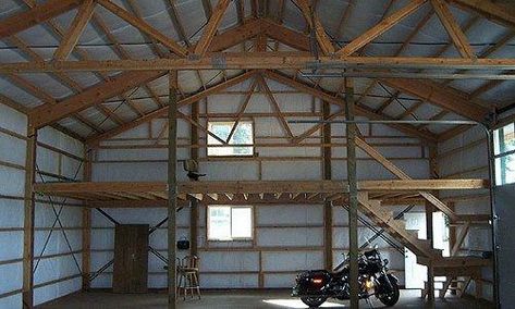 Tips on adequately designing a mezzanine in a new pole building. The Pole Barn Guru digests the International Building Code for attic loft space use. Pole Barn Loft, Pole Barn Shop, Pole Barn Loft Ideas, Diy Pole Barn, Floor Construction, Metal Pole Barns, Pole Barn Kits, Pole Barn Designs, Pole Barn Plans