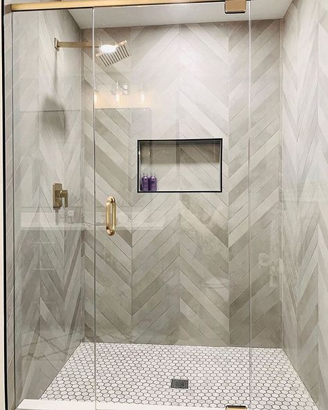 Mission Stone & Tile on Instagram: “We can’t get enough of this amazing shower by @aleciamariana. The bathroom walls covered in Mate Chevron | Terra Grigio looks…” Herringbone Marble Bathroom Wall, Shower With Herringbone Tile, Showers With Black Floor, Chevron Shower Tile, Bathroom Gold Hardware, Room Tiles Design, Laundry Room Tile, Bathroom Shower Walls, House Bathrooms