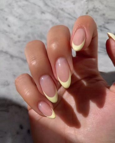 French Yellow Tip Nails, Light Yellow French Tip Nails Almond, White And Yellow French Nails, Light Yellow Nails French Tip, Nails For Summer Yellow, Pale Yellow Almond Nails, Hailey Bieber Yellow Nails, Yellow Nails For Prom, Light Yellow French Tip