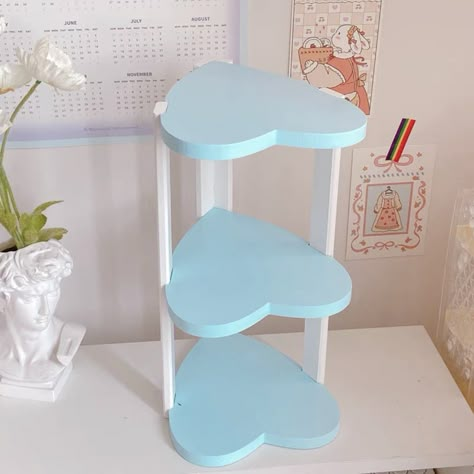 This 3-layer kawaii shelf is ideal for organising cosmetics, student dormitory items, and displaying belongings. Its love heart shape shelves makes it perfect for any girl's bedroom or desktop. Material: Wood Kawaii Room Accessories, Cute Items For Bedroom, Heart Bedroom Decor, Cute Cheap Room Decor, Heart Shaped Furniture, Cute Furniture For Bedroom, Kawaii Shelf Ideas, Kawaii Shelf, Items For Room