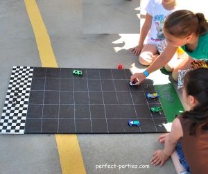 I like the idea of playing this in teams.  One rolls the dice and the other moves.  Winner is the first car crossing the finish line. Carnival Dice Game, Indoor Carnival Games, Race Car Games, Indoor Carnival, Penny Game, Fall Festival Games, Carnival Games For Kids, Fall Carnival, Festival Games