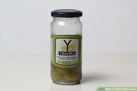 How to Make Olive Juice: 15 Steps (with Pictures) - wikiHow Olive Juice, Bar Drinks, Tea Bottle, Cocktail Drinks, Fatty Acids, Coconut Oil Jar, Vitamin E, Health Benefits, Cucumber