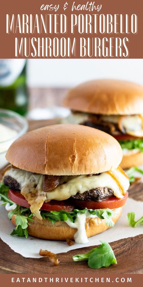 These oven baked Portobello Mushroom Burgers are an easy, heart healthy mid-week meal. Tender portobella mushrooms, marinated in balsamic & garlic, with Swiss cheese, caramelised onions, & a creamy truffle sauce. Cooked in 25 minutes, these marinated portobello burger recipe can be made in the oven, on the stove or grill, or in an air fryer. The portobello mushrooms are juicy & tender! Get the best Baked Portobello Mushroom Burger & more easy heart healthy recipes at eatandthrivekitchen.com Grilled Marinated Portobello Mushrooms, Portabella Steak Recipe, Portobello Mushroom Burger Recipes, Portabello Mushrooms Recipes Vegan, Mushroom Burgers Vegetarian, Portabello Mushrooms Burger, Mushroom Burgers Portobello, Portabella Sandwich, Portabella Steak