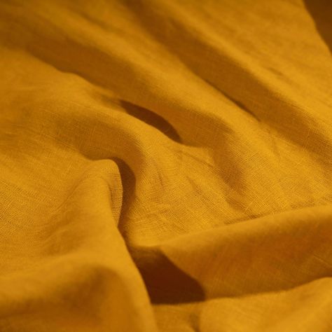 Our 100% Golden Mustard Yellow Linen Fabric is expertly woven from sustainable European flax then stonewashed to add ultimate softness to the natural linen you know and love. Crafted in Europe to OEKO-TEX® standards and intentionally created to last, this fine quality linen makes one of the best fabrics for dress making, curtains, cushions, bedding, tablecloths, napkins and other home textiles. Composition: 100% natural European linen Weight: 205 g/m² or 6.05 oz/yd² Width: 145 cm or 57" Country Burnt Yellow Color, Mustard Yellow Color, Mustard Fabric, Warm Yellow, Mustard Yellow Aesthetic, Mustard Color, Sustainable Textiles, Vintage Suits, Dressmaking Fabric