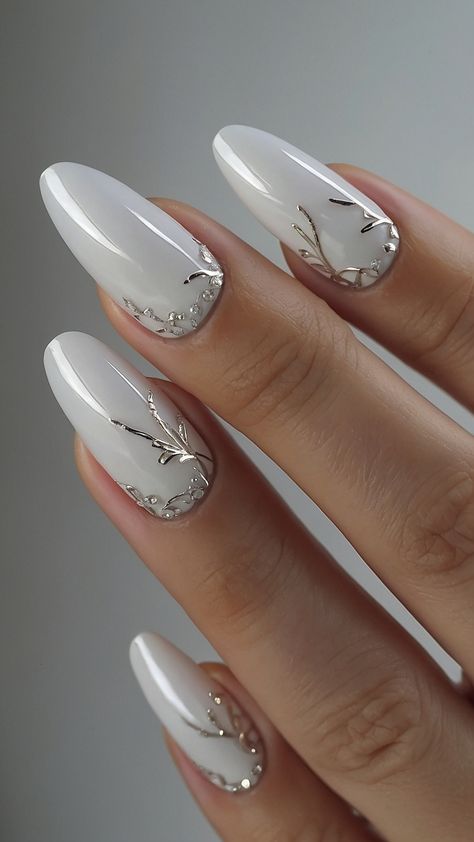 Discover stunning white nails with a milky design that's trendy and cute Get inspirations for black and blue pink and short red and milky pearl nail art ideas Perfect for your next nail design Simple Nail Designs Milky White, Pearl White Christmas Nails, Black Silver And Red Nails, Milky White Winter Nails, Winter White Nail Designs, Nails Milky White Design, White Nails With Accent Nail, White Gel Nails With Design, White Nails Design Ideas